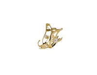 Gold hair clip with two pearl accents and openwork swirl frame