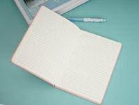 A5 PU notebook open to lined pages, pink cover with purple band