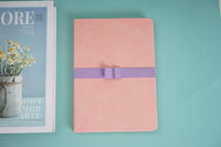 A5 PU rubber cover notebook, pink with purple band, closed
