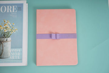 A5 PU rubber cover notebook, pink with purple band, closed