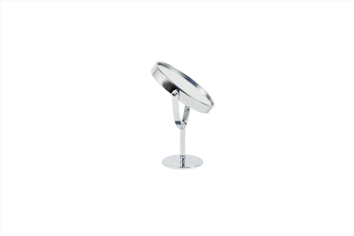 Round makeup mirror with angled head, chrome stand, and round pedestal base, side view.