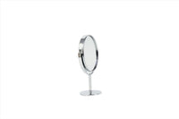 Round makeup mirror with circular frame, chrome stem, and round pedestal base, side view.