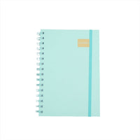 A5 daily planner notebook front: light turquoise cover with spiral rings and gold label