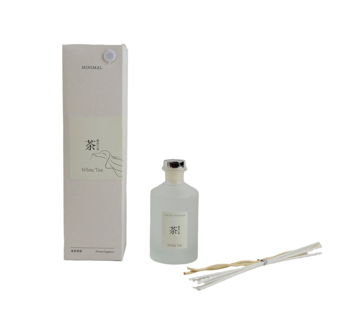 White tea reed diffuser bottle with reeds and matching minimalist gift box