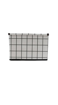 Fabric storage box with grid pattern and dark trim, closed top with grommets