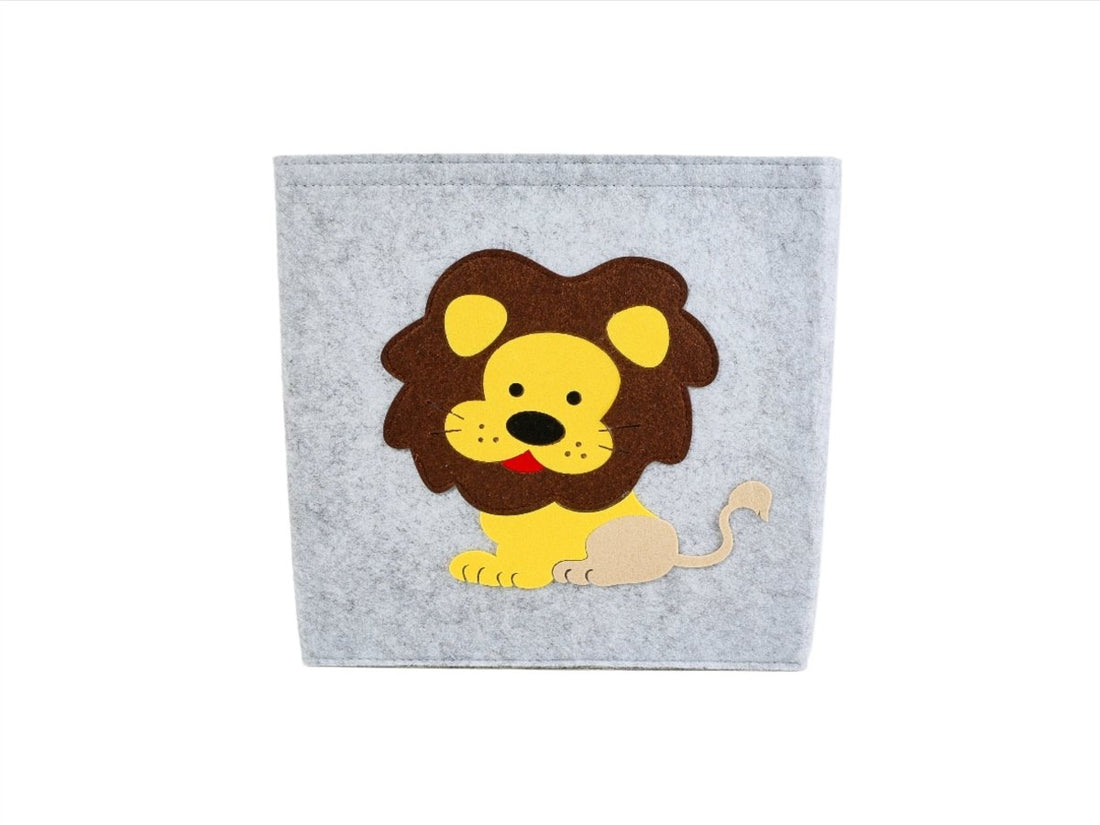 Felt animal storage basket with lion face appliqué, gray felt with brown and yellow details.