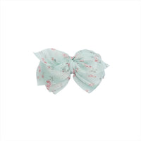 Floral fabric bow hair clip in mint with pink flowers, side bow with attached clip