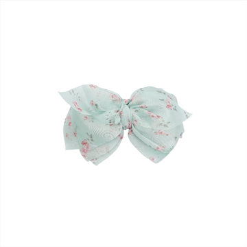 Floral fabric bow hair clip in mint with pink flowers, side bow with attached clip