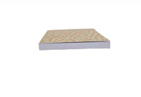 Closed notebook with floral top cover and gray sides