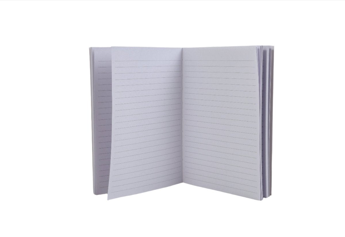 Open notebook with gray lined pages and soft cover
