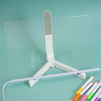 Foldable LED writing board with clear panel, open tripod stand, and colored markers