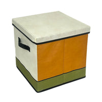 Foldable storage box with lid closed, cream, orange, and green color blocks, black handle.