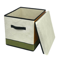 Foldable storage box with hinged lid open, cream interior, green bottom, black trim.