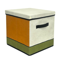 Foldable storage box with lid, cream and orange sides, green base, black pull handle.