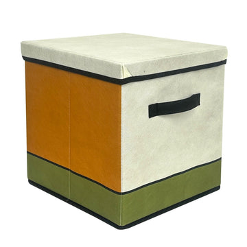Foldable storage box with lid, cream and orange sides, green base, black pull handle.