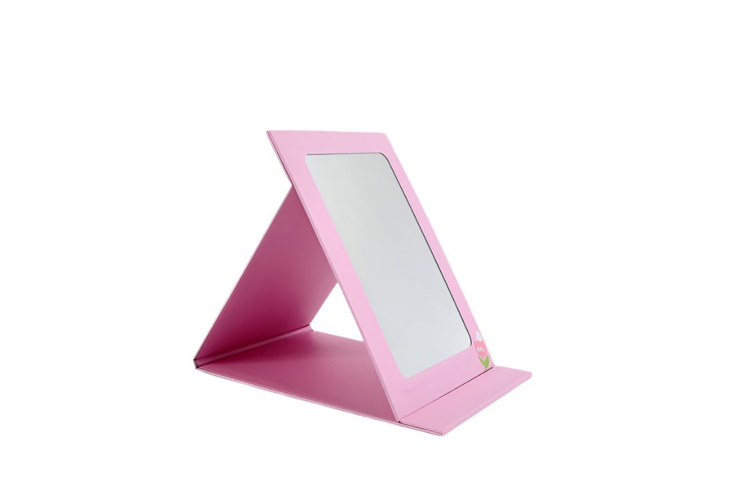 Pink foldable tabletop mirror with blank reflective panel