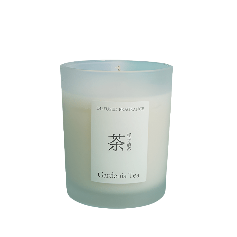 Gardenia tea scented candle in minimal glass jar, pale blue tinted wax
