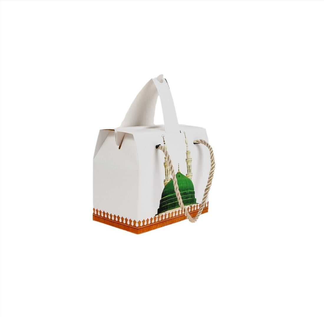 White gift box with rope handle and Prophet's Dome design, green dome on front