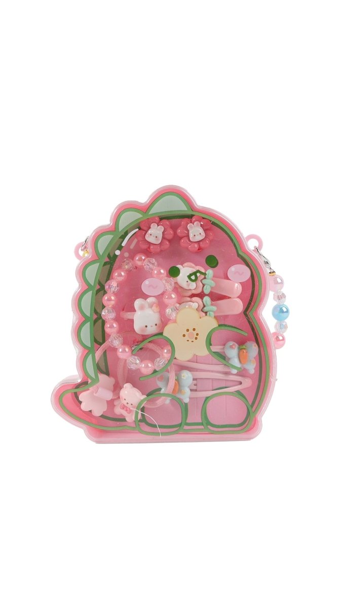Dinosaur hair charm clip with pink glitter, green frame, and dangling beads