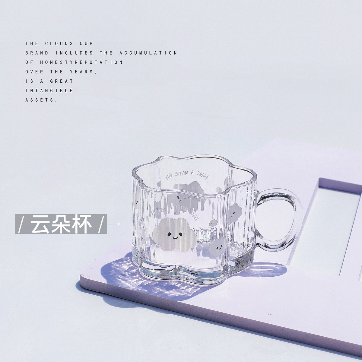 Clear glass mug with bear face print, clear body and loop handle