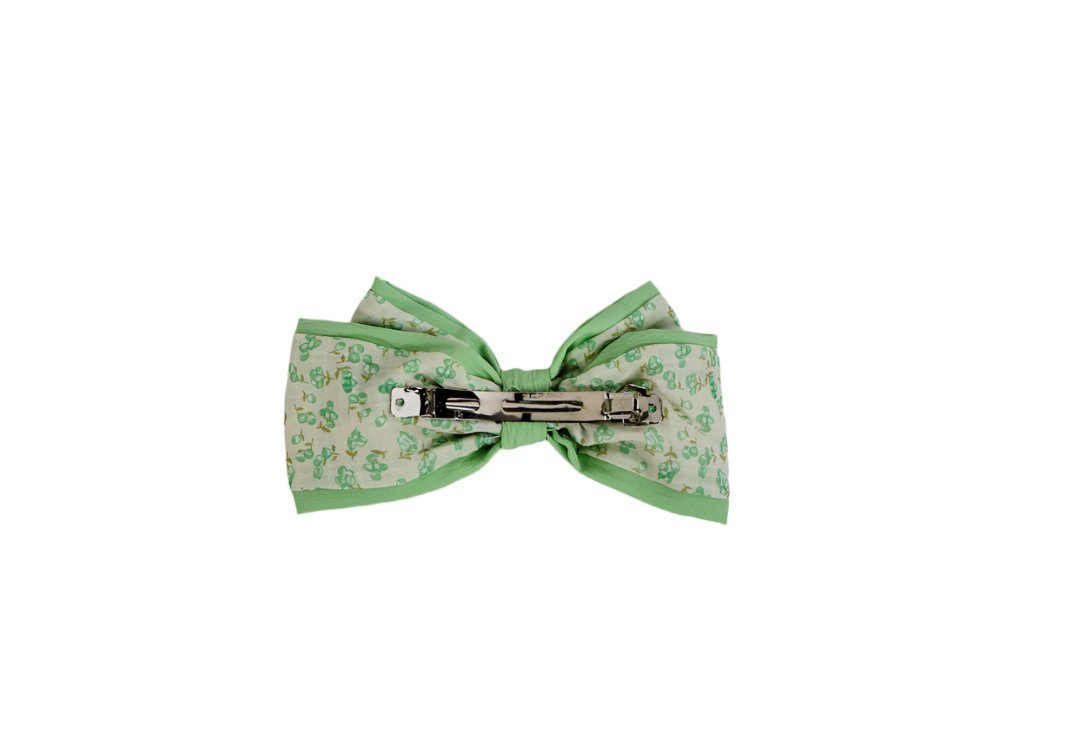 Green floral bow hair clip with black center clasp