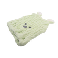 Light green hair-drying cap with embroidered face patches, textured terry fabric
