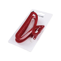 Red hair claw clip with curved loop design, packaged on card