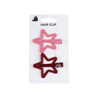 Star hair clip set with pink and dark red clips on a blister card