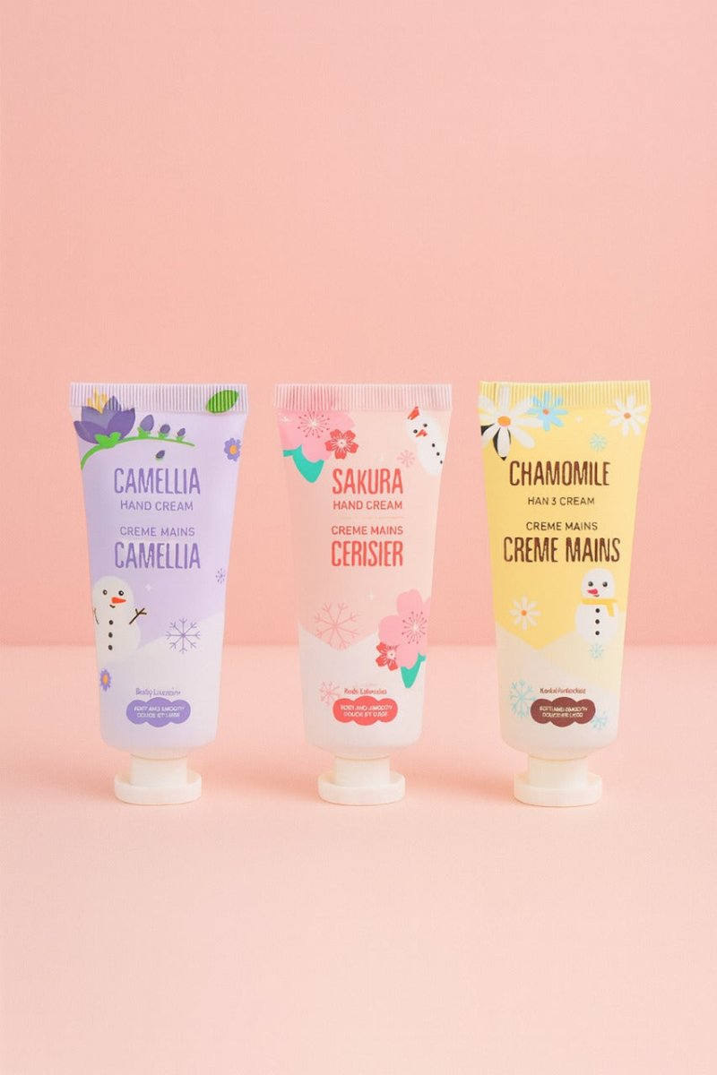 Three hand cream tubes with Camellia, Sakura Ceriser, and Chamomile labels