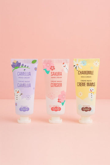 Three hand cream tubes with Camellia, Sakura Ceriser, and Chamomile labels