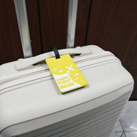 Yellow luggage tag with black strap, Happy Flight design and airplane graphics