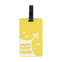 Yellow luggage tag with black strap and Happy Flight plane, clouds, and sun graphic