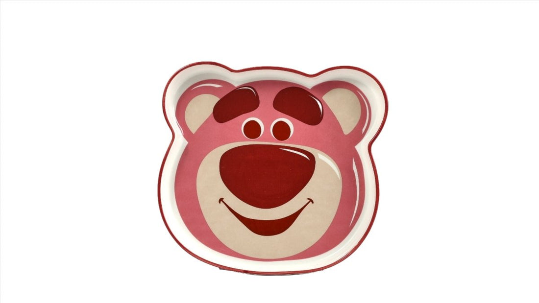 Bear-shaped plate with strawberry bear face, red and pink graphics on white