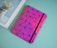 Holographic geometric notebook, pink cover with black stripe and geometric lines