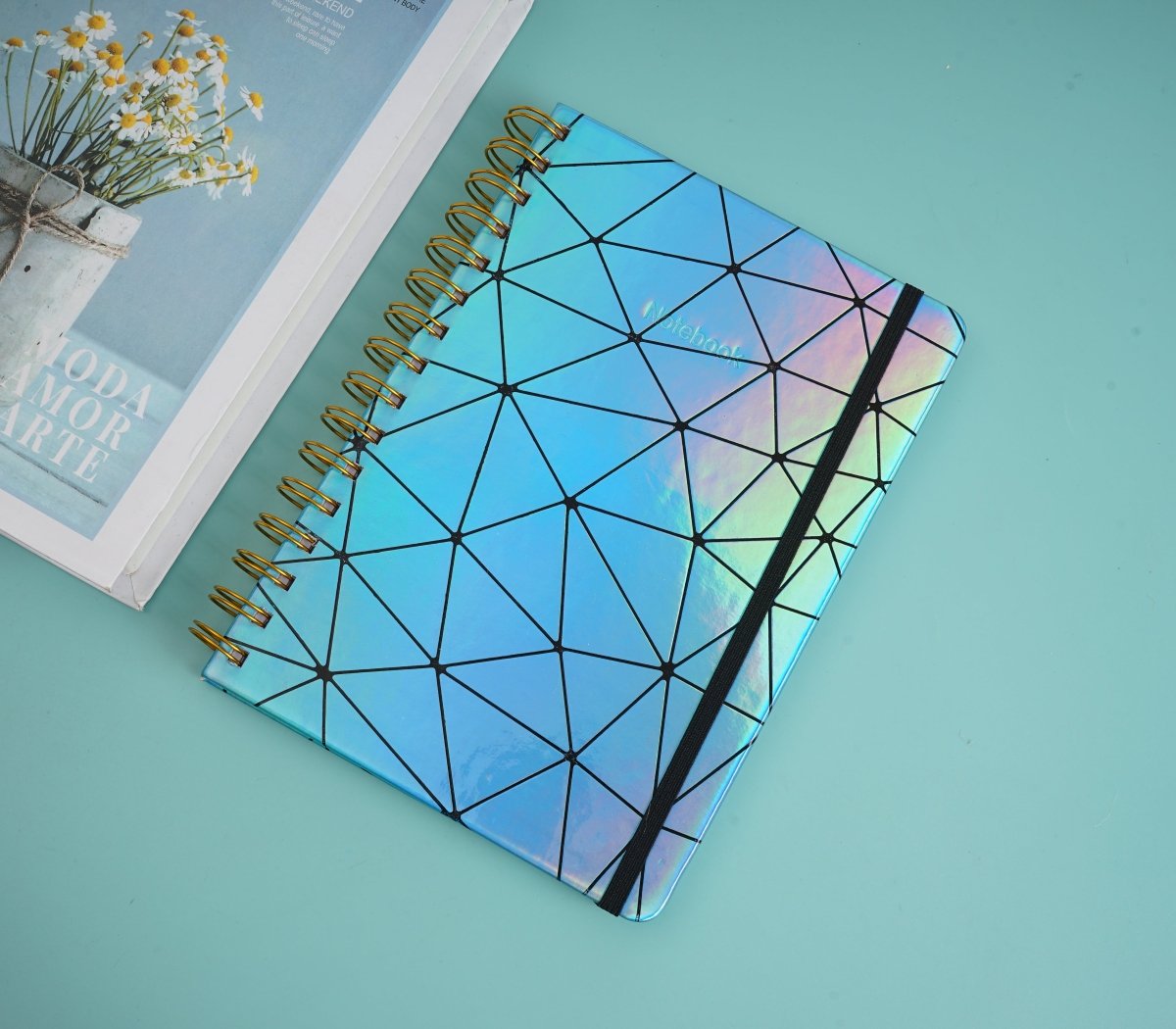 Holographic geometric notebook, blue cover with black stripe and geometric lines