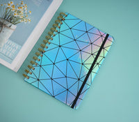 Holographic geometric notebook, blue cover with black stripe and geometric lines
