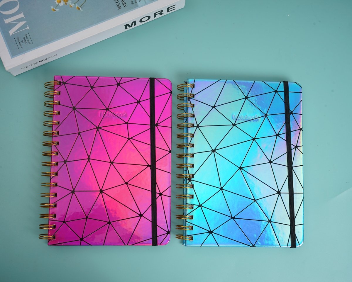 Holographic geometric notebook set, pink and blue covers with gold spiral rings