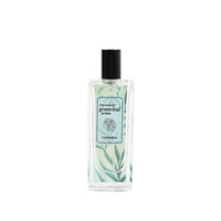 Women’s perfume bottle with green leaf design label and black spray cap, 25 ml