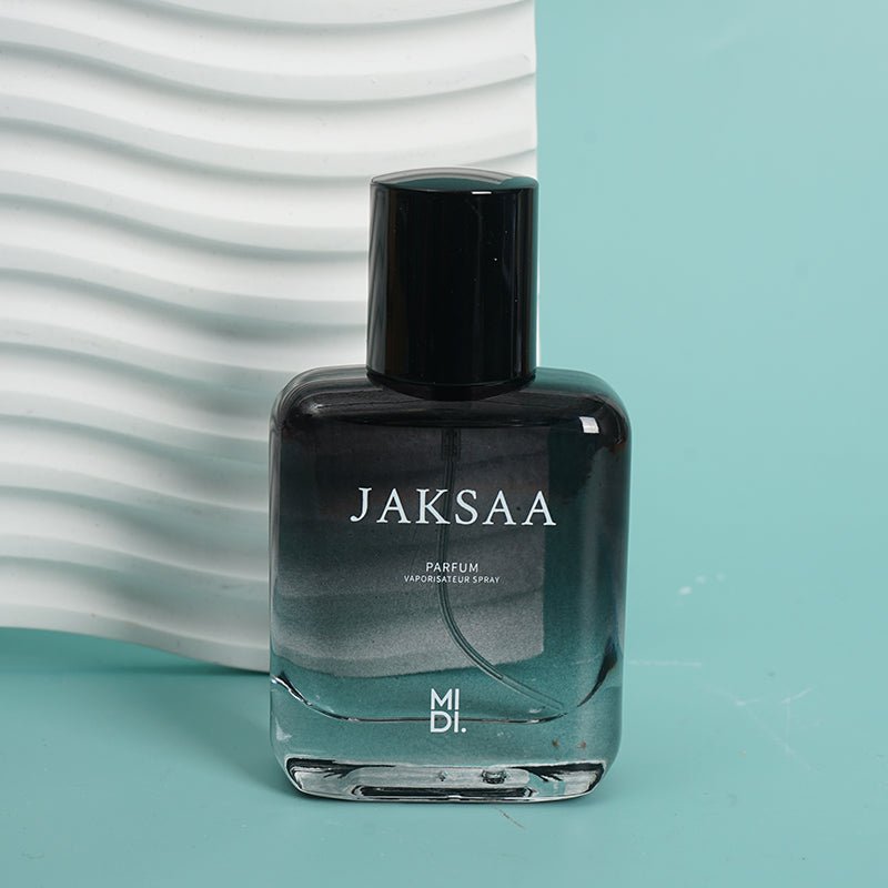 JAKSAA men's perfume bottle with black cap and front label