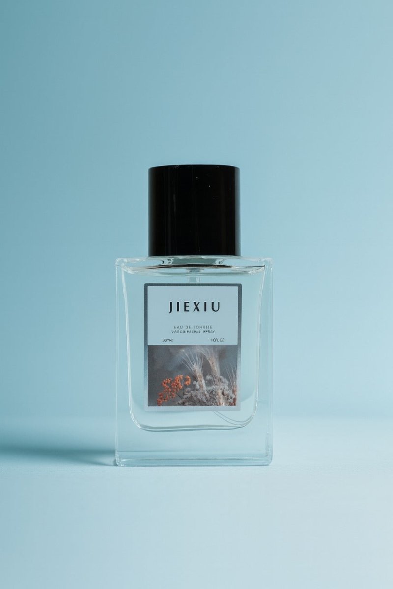 JEXIU eau de toilette bottle with black cap, clear rectangular glass