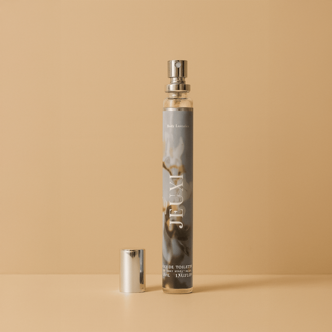 JEXIU eau de toilette spray bottle with silver cap, frosted grey bottle.