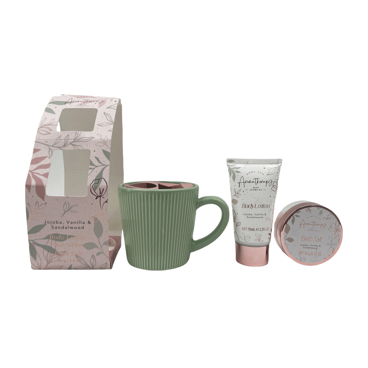 Gift set items: paper bag, green mug, bath salt tin, and body lotion tube