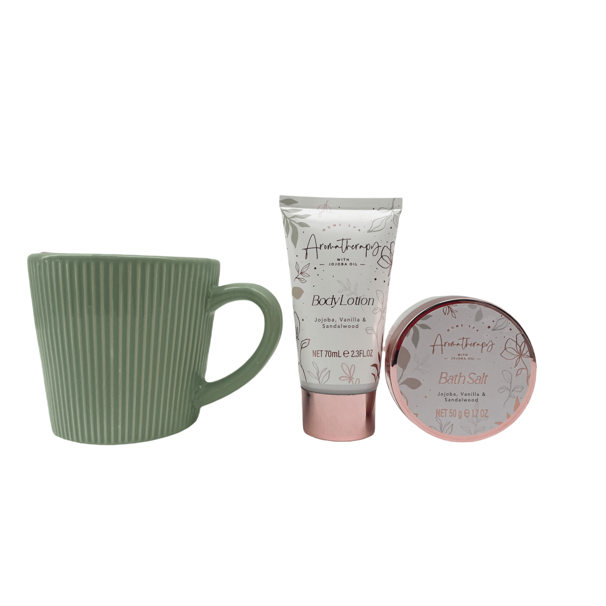 Gift set with green mug, body lotion tube, and bath salt tin with rose-gold rim