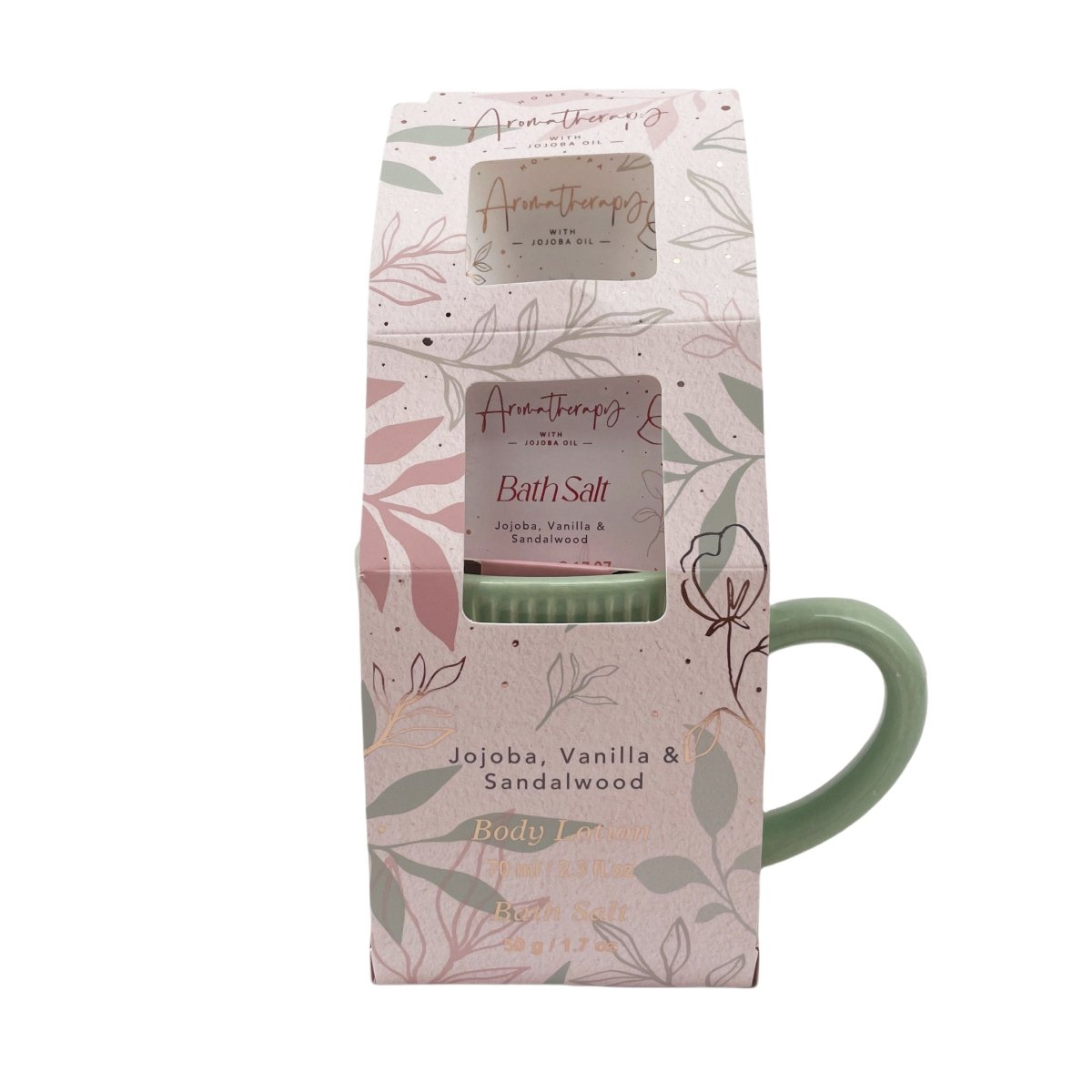 Floral-pattern gift bag with cutout showing bath salt and green mug handle
