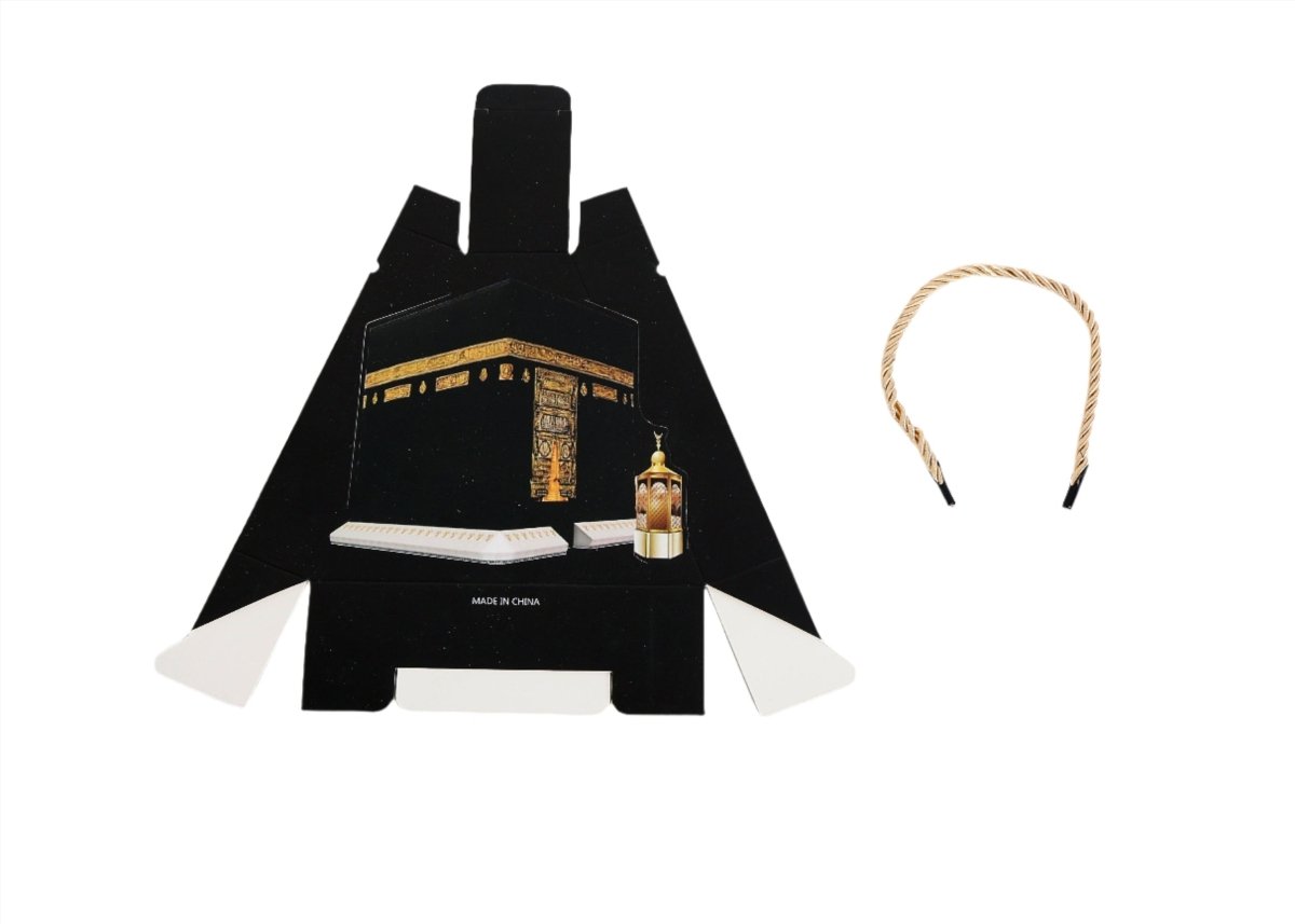 Kaaba gift box, black base with gold Kaaba print and rope handle ends, lantern.