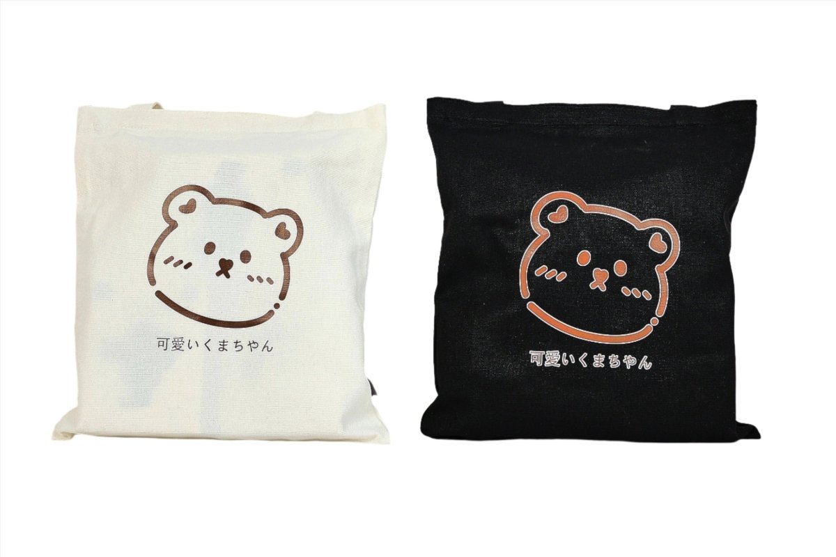 White and black bear tote bags with cartoon bear faces and Japanese text