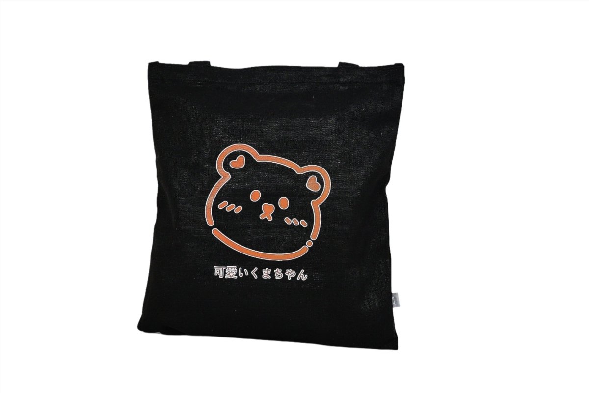Black bear tote bag with centered cartoon bear face and Japanese text