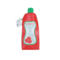 Red ketchup-shaped pencil case with green cap and Ingredients label on back