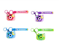 Silicone keychain camera set with SURFINGRABBIT designs in pink, blue, green, purple