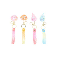 Bubble design keychains with pastel heart and puff charms, each on a metal ring